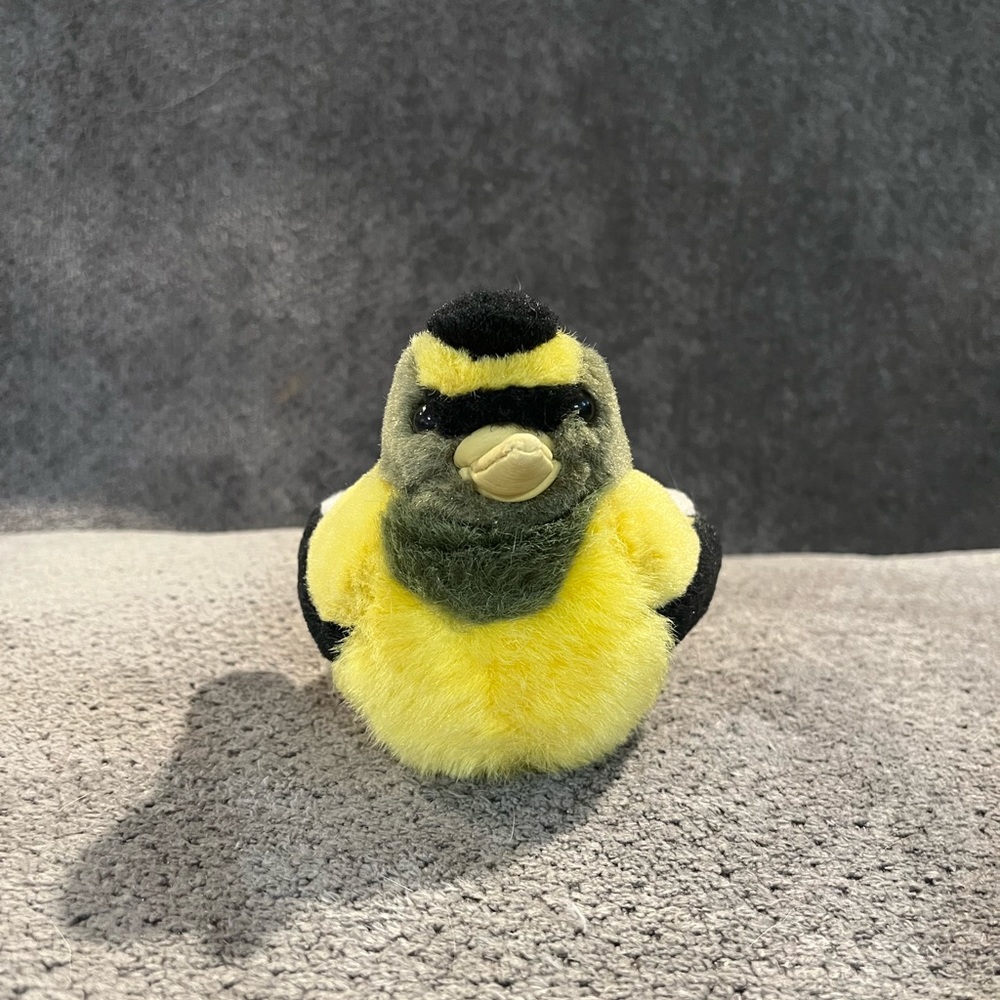 Small bird plush yellow, black, grey and white